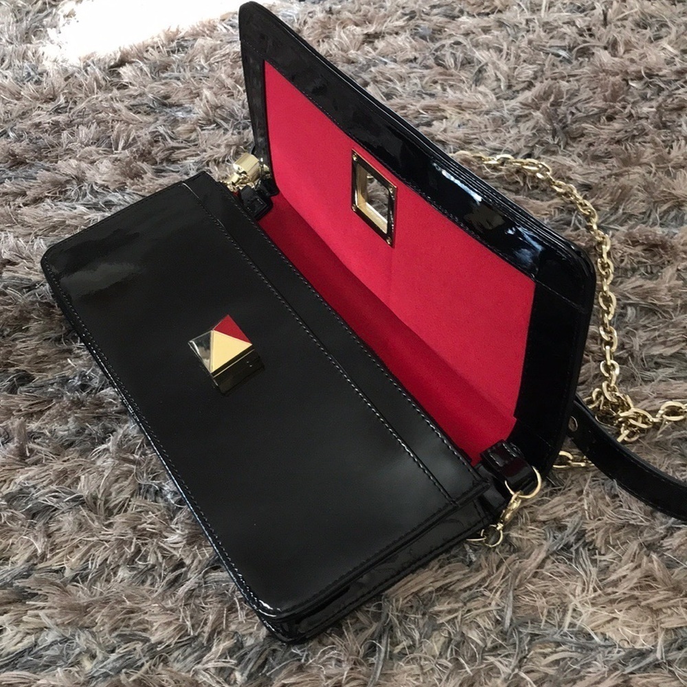 Animal print clutch/shoulder strap included Gold Hardware